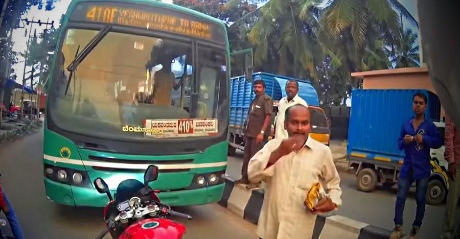 Angry superbiker stops bus coming the WRONG way: Makes bus go back! [Video]