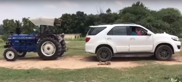 Toyota Fortuner vs Escorts Farmtrac tractor in a tug of War: Who’s the BOSS [Video]