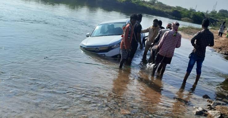 Doctor & family drive SUV straight into canal after following Google Maps