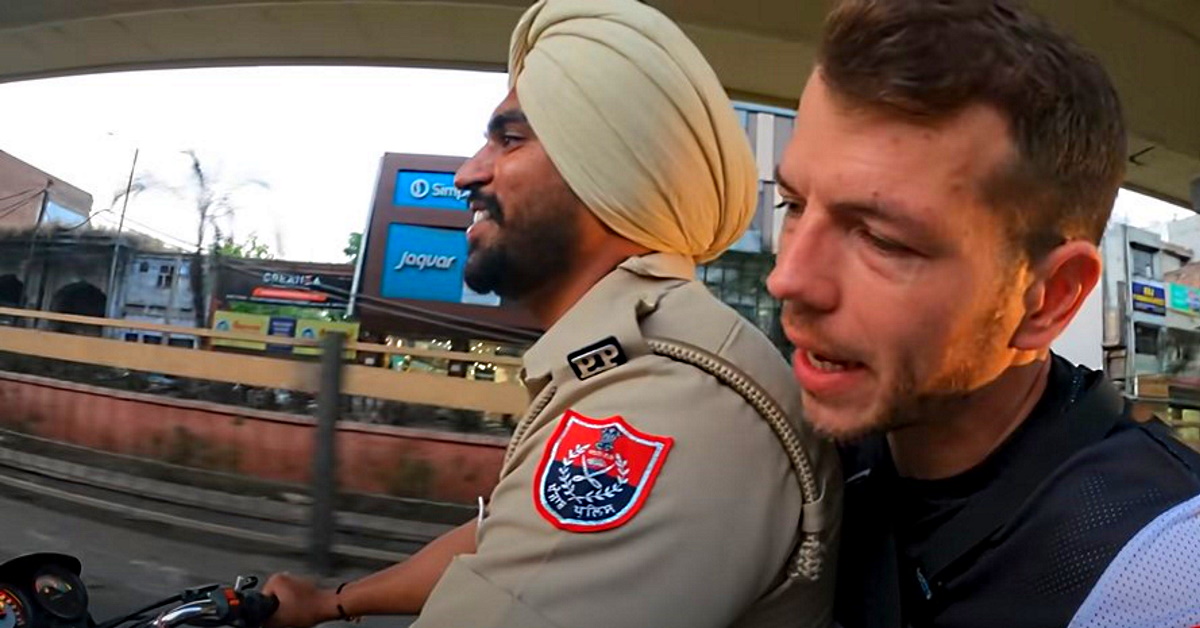 Punjab Police cop helps a French tourer on Ducati Scrambler [Video]