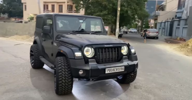 Mahindra Thar SUV modified with 22 inch aftermarket alloy wheels