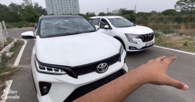 Mahindra XUV700 competes with a Toyota Legender SUV in a drag race