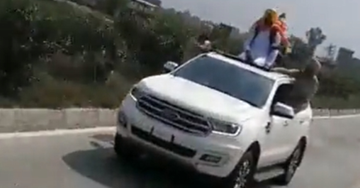 Punjab Transport Minister travels sitting on Ford Endeavour’s sunroof [Video]