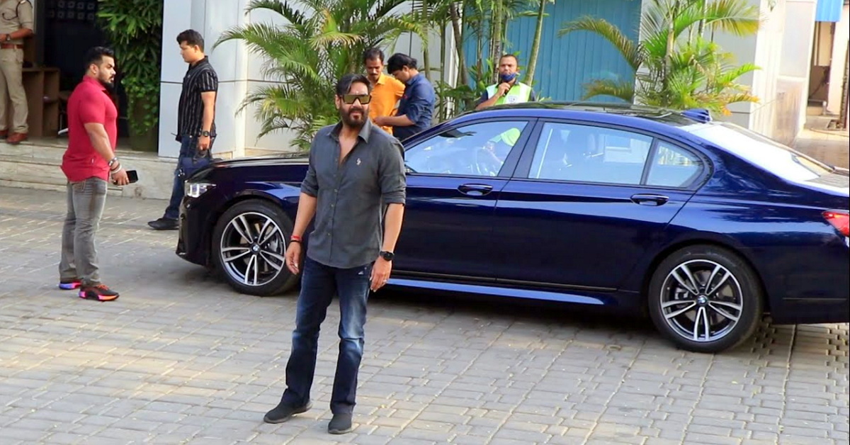 Ajay Devgn drives away in his new BMW 7-Series luxury sedan