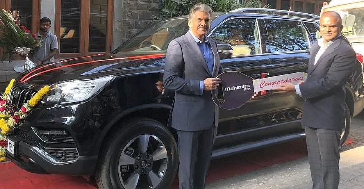 Anand Mahindra & the Mahindra SUVs he owns