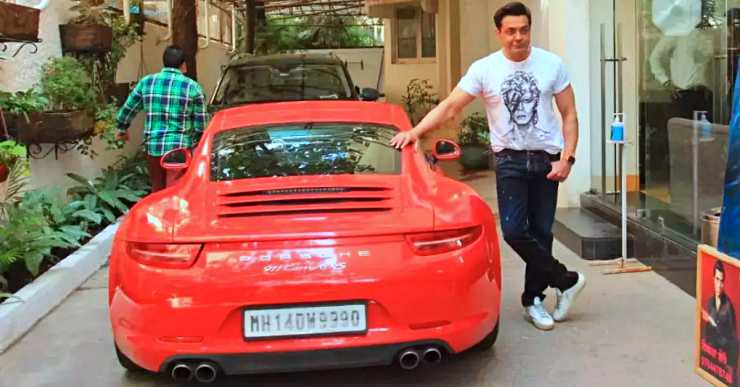 Sunny Deol and father Dharmendra pose with their newest Porsche – a 911 GT3