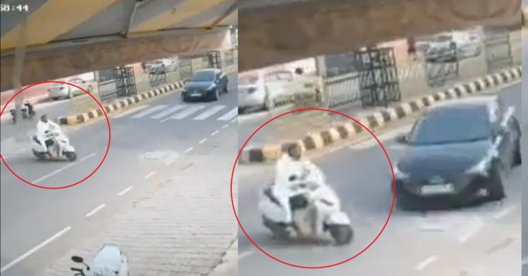 Careless scooter rider talking on phone causes crash on the road: Escapes unhurt [Video]