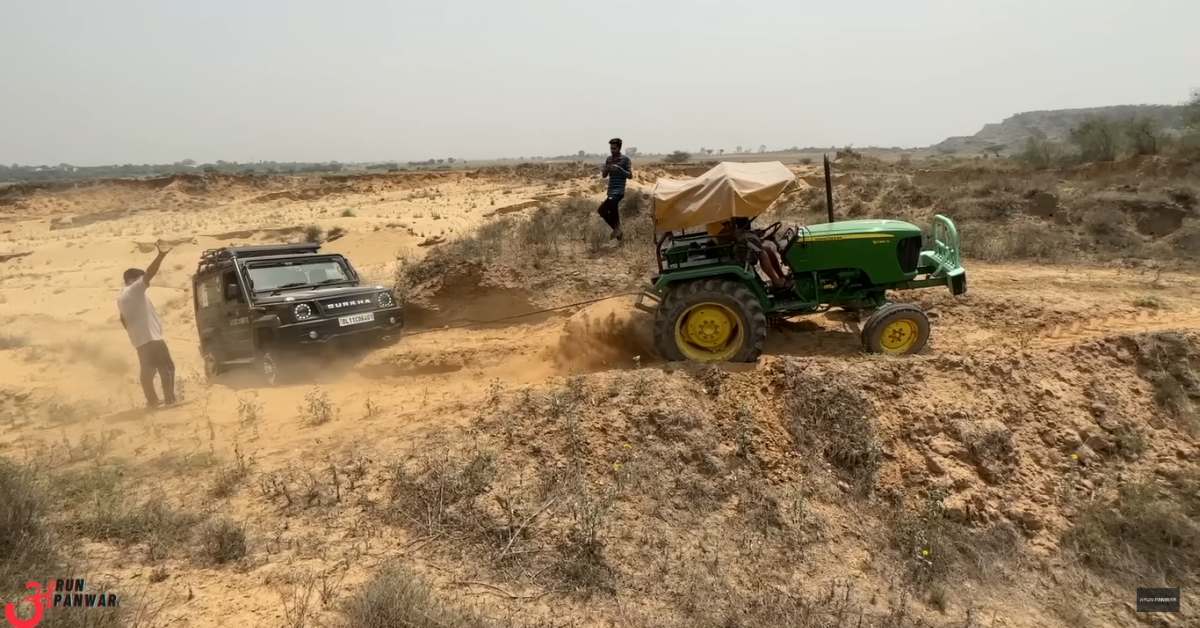 Tractor rescues Force Gurkha stuck in sand