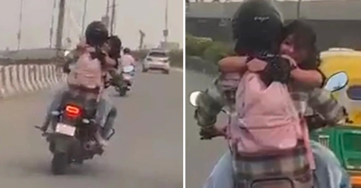 couple romancing on moving yamaha fz motorcycle
