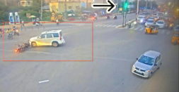 Mahindra Scorpio driver jumps signal & hits biker in Hyderabad: Escapes without stopping [Video]