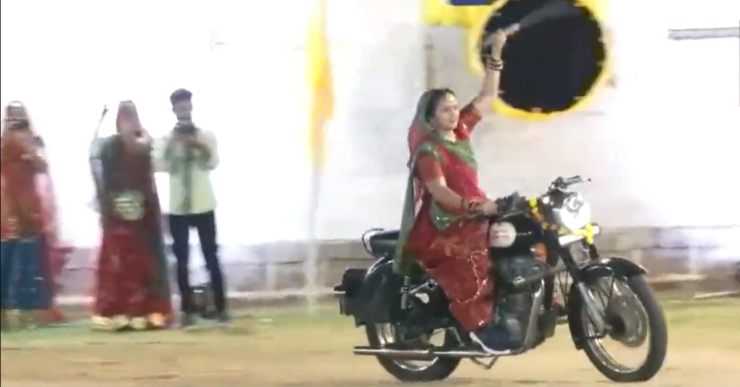 Women on Royal Enfield and Land Rover perform ‘Garba’ with swords in their hands [Video]