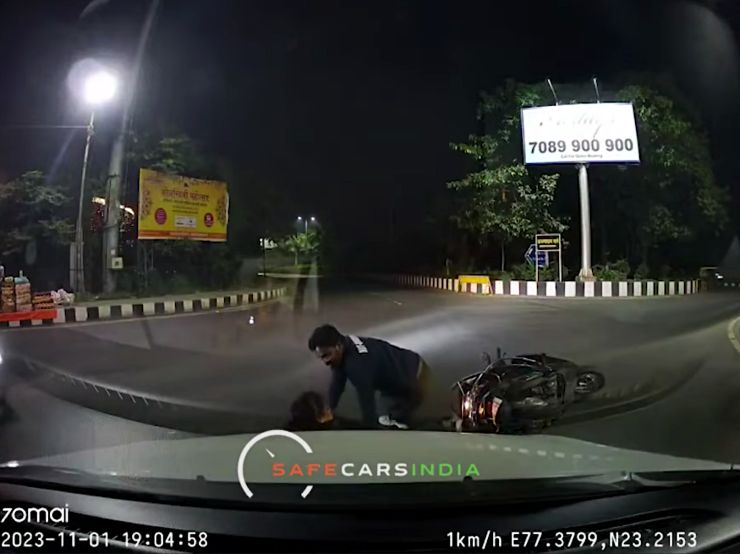 Distracted sedan driver crashes into a two-wheeler: Caught on live camera
