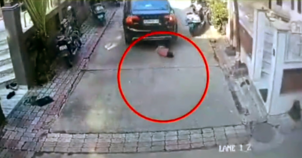 volvo car runs over kid surat gujarat