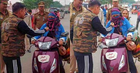 Woman gets caught without helmet and number plate
