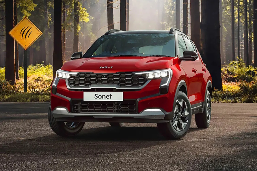 Kia Sonet HTX Turbo iMT vs Maruti Suzuki Brezza ZXi DT: The Ultimate Compact SUV Showdown for Young Professionals