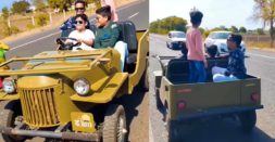 Kids In An Electric Jeep Go For A Drive On A Public Road