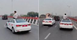 Youth Sitting On Moving Audi's Roof fined Rs. 31,000 [Video]