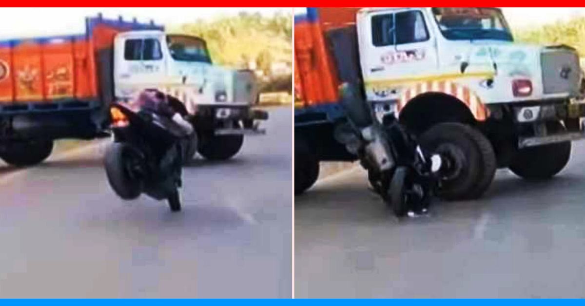 Biker crashes into the wheel of a truck Biker crashes into the wheel of a truck