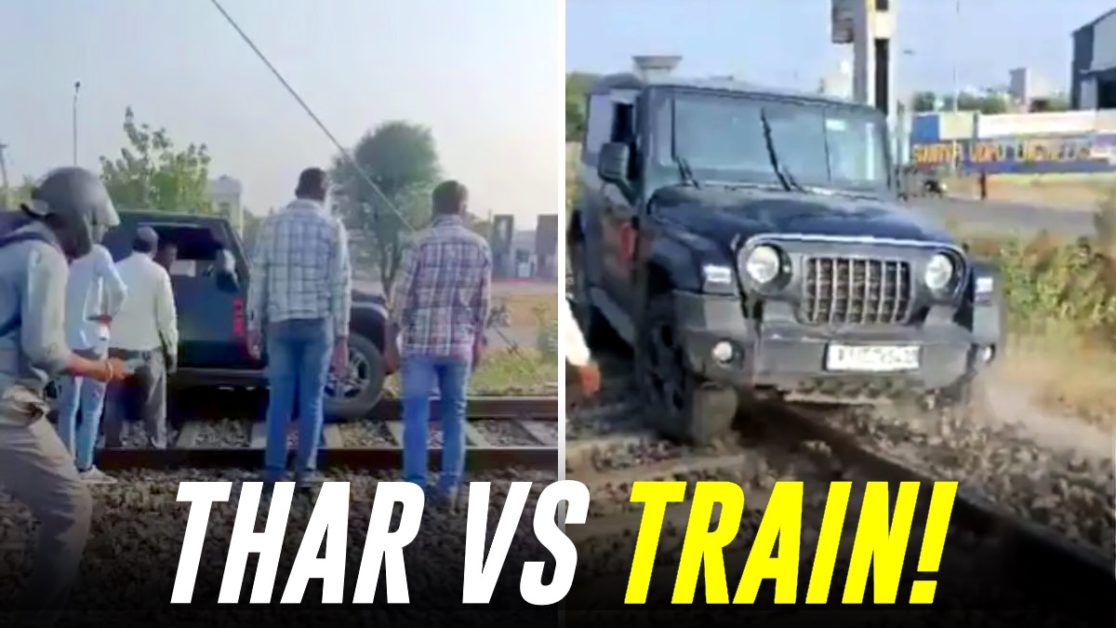 drunk man drives mahindra thar on railway track