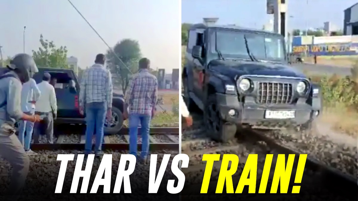 drunk man drives mahindra thar on railway track