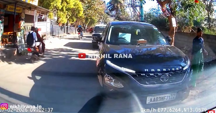 Harrier-driver-using-laptop-while-driving