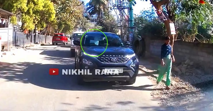 Tata-Harrier-Driver-using-laptop-while-driving